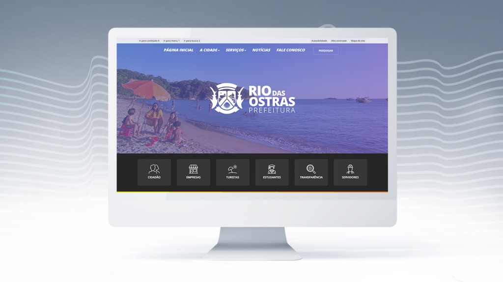 Imagem de um computador com a primeira página do site da prefeitura aberta